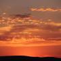 Kazakhstan - Soleil couchant sur la steppe.